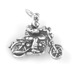 Silver motorcycle with rider charm