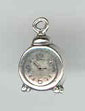 Silver alarm clock charm